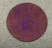 Oxidized silicon wafer showing interference color